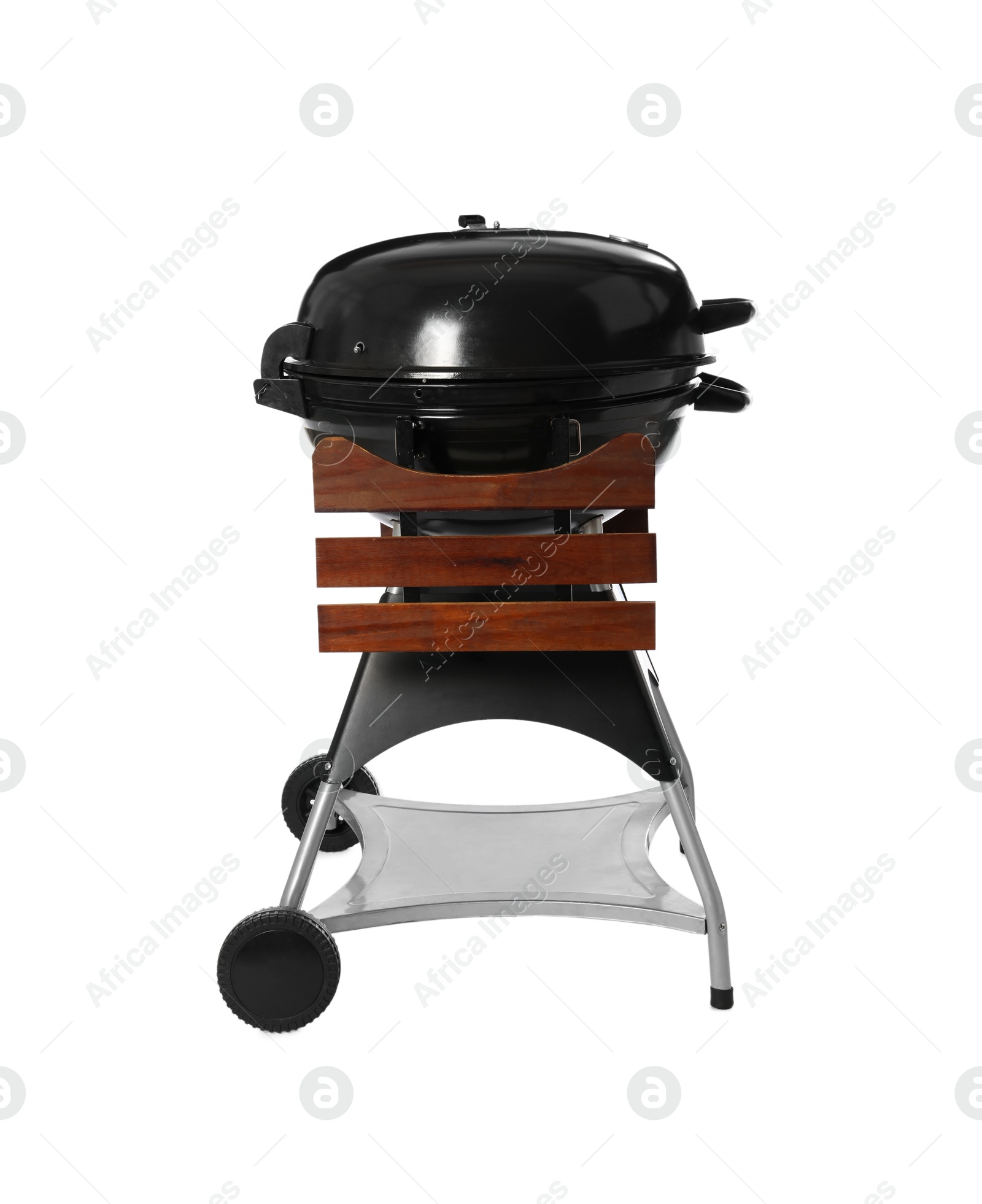 Photo of One black barbeque grill isolated on white. Cooking appliance