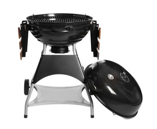 Photo of One black barbeque grill isolated on white. Cooking appliance