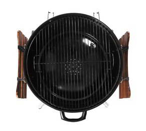 Photo of One black barbeque grill isolated on white, top view. Cooking appliance