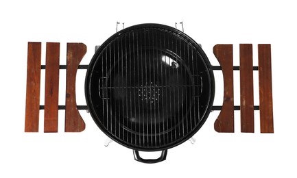 Photo of One black barbeque grill isolated on white, top view. Cooking appliance