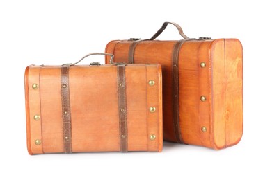 Two new wooden suitcases isolated on white