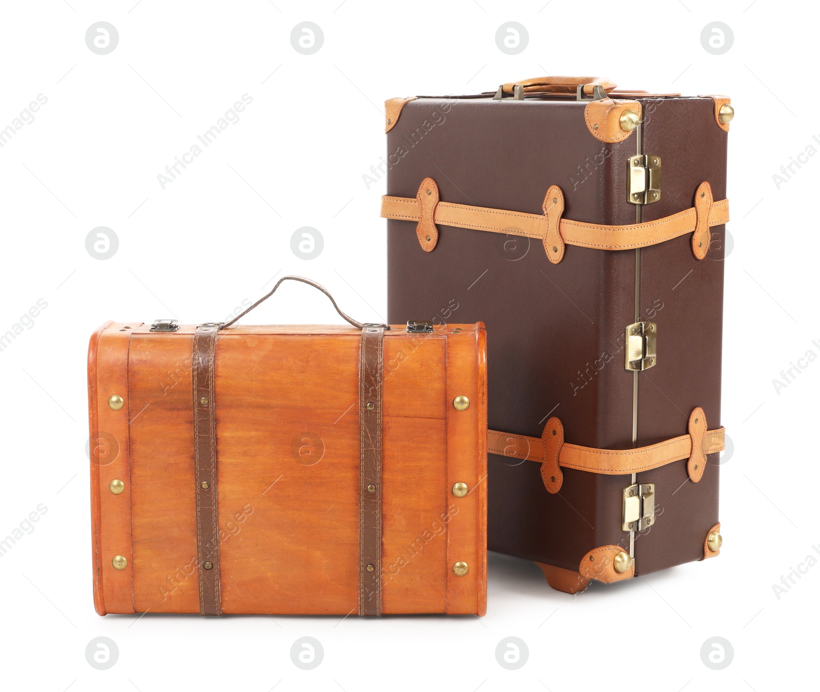 Photo of Two new brown suitcases isolated on white