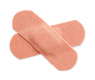 Photo of Medical adhesive bandages isolated on white, top view