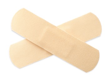 Photo of Medical adhesive bandages isolated on white, top view