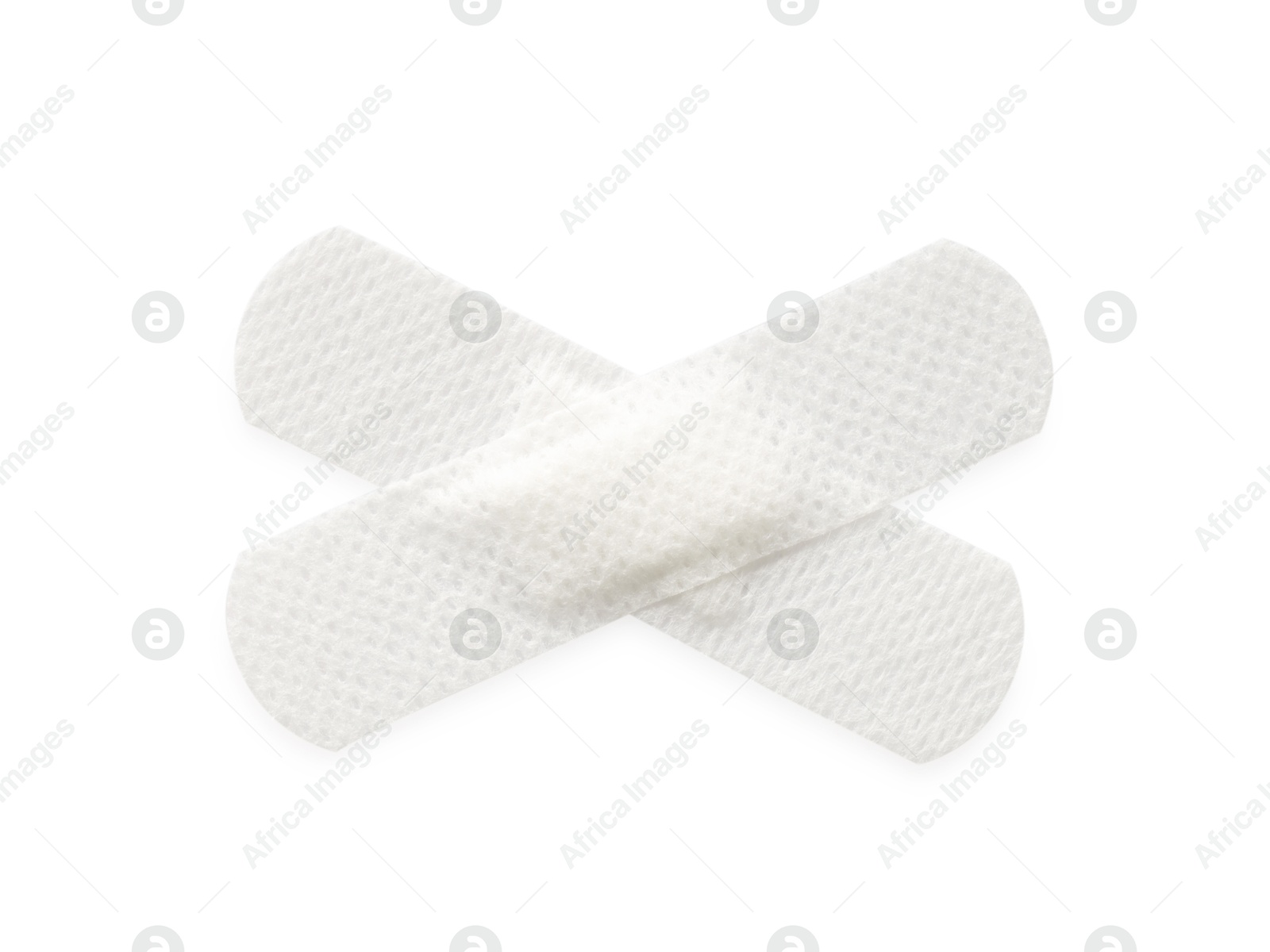Medical adhesive bandages isolated on white, top view Photo of Medical adhesive bandages isolated on white, top view
