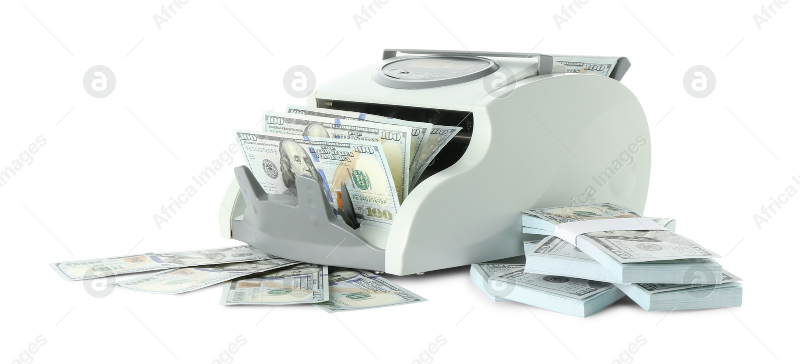 Photo of Money counter machine and dollar banknotes isolated on white