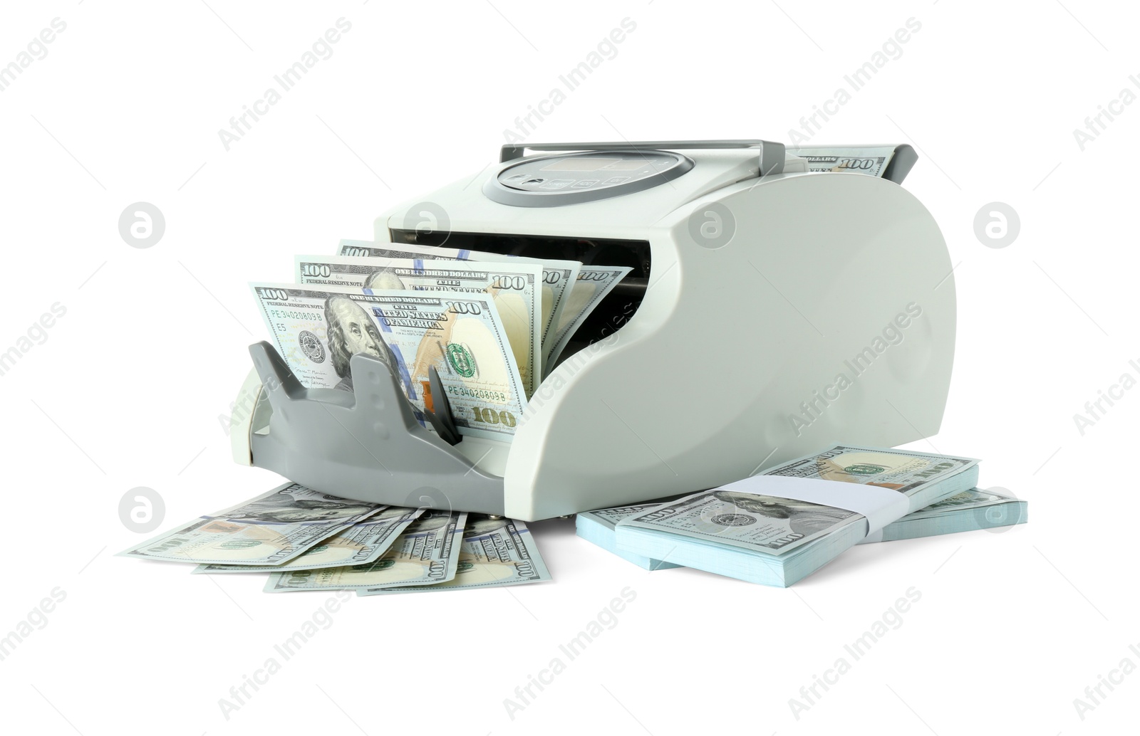 Photo of Money counter machine and dollar banknotes isolated on white