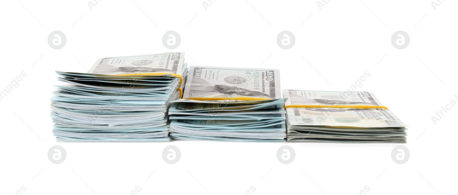 Photo of Stacks of dollar banknotes isolated on white