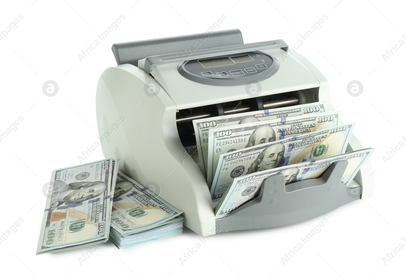 Photo of Money counter machine and dollar banknotes isolated on white