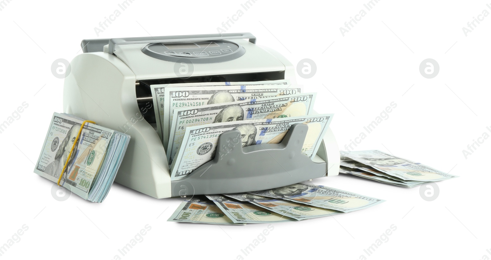 Photo of Money counter machine and dollar banknotes isolated on white