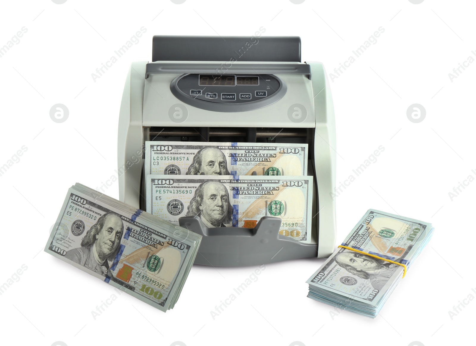 Photo of Money counter machine and dollar banknotes isolated on white, above view