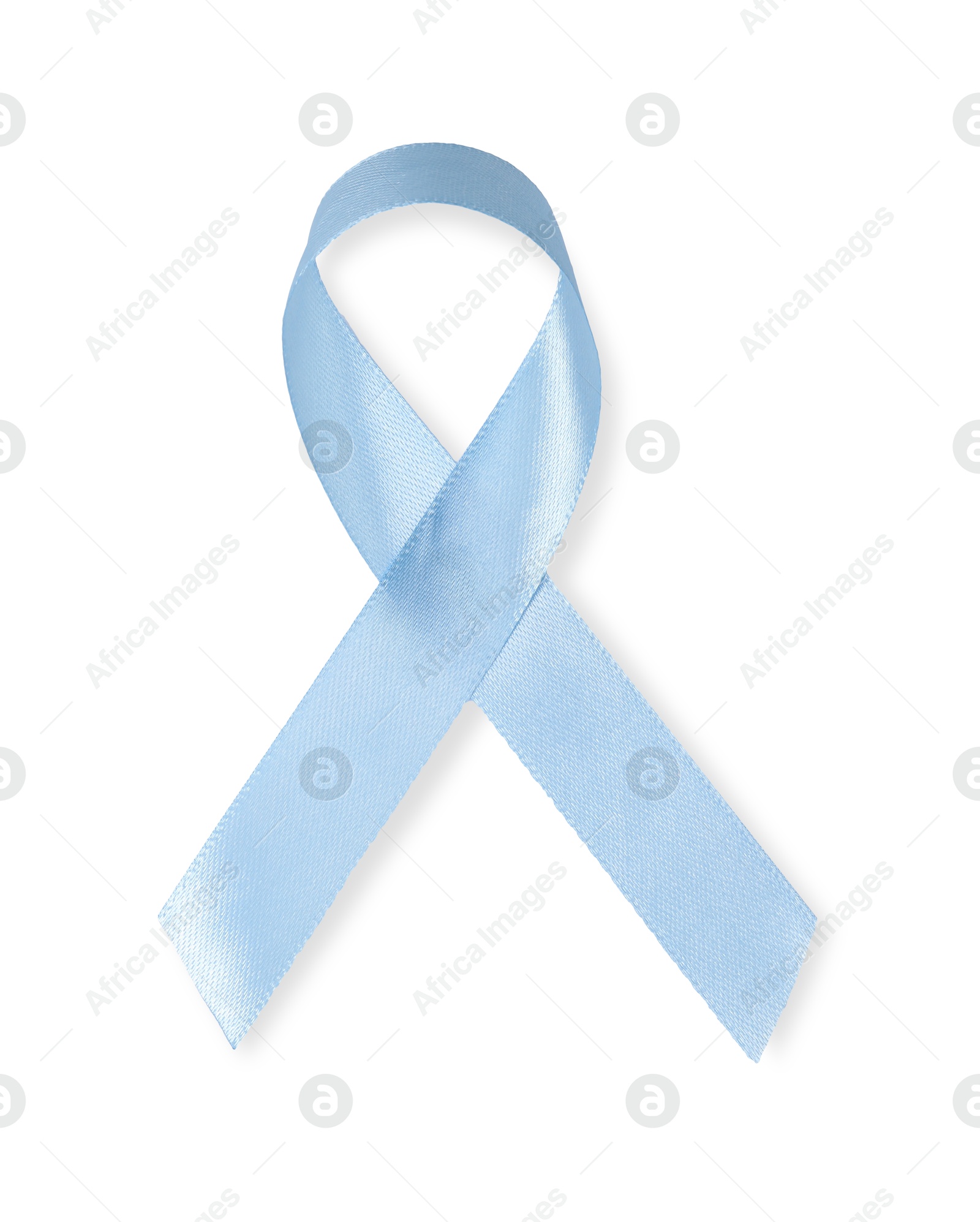 Photo of Light blue ribbon isolated on white, top view. Prostate cancer awareness