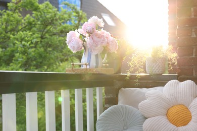 Photo of Balcony garden. Different plants growing on railings outdoors