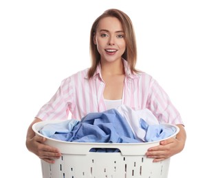 Photo of Happy young housewife with basket full of laundry on white background