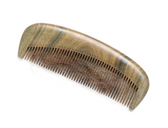 Photo of One comb with lost hair isolated on white, top view