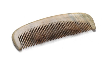 Photo of One comb with lost hair isolated on white