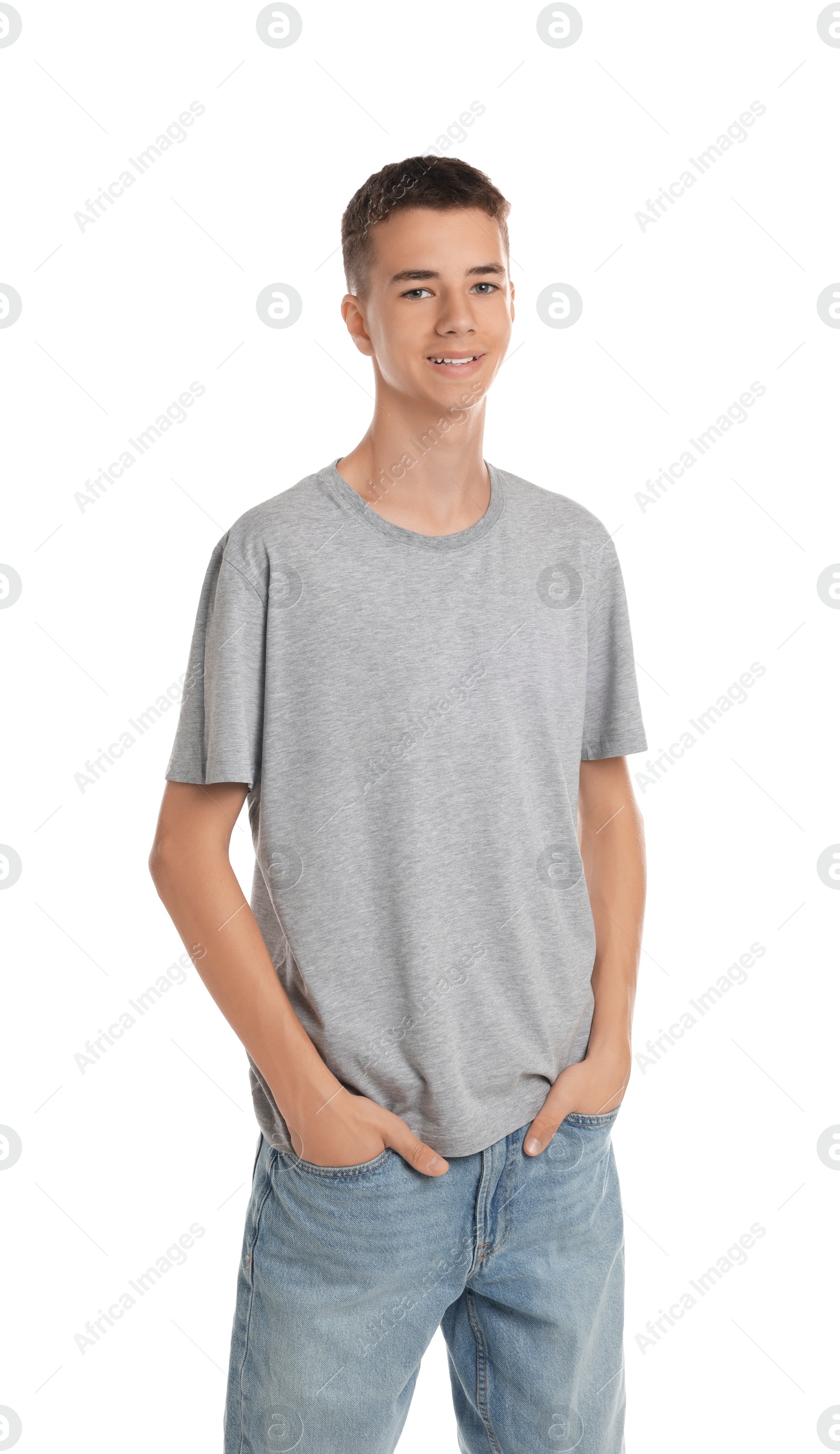 Photo of Teenage boy wearing grey t-shirt on white background