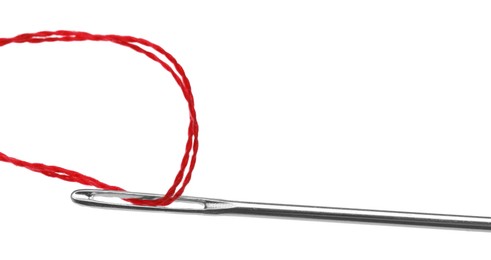 Sewing needle with red thread isolated on white, closeup