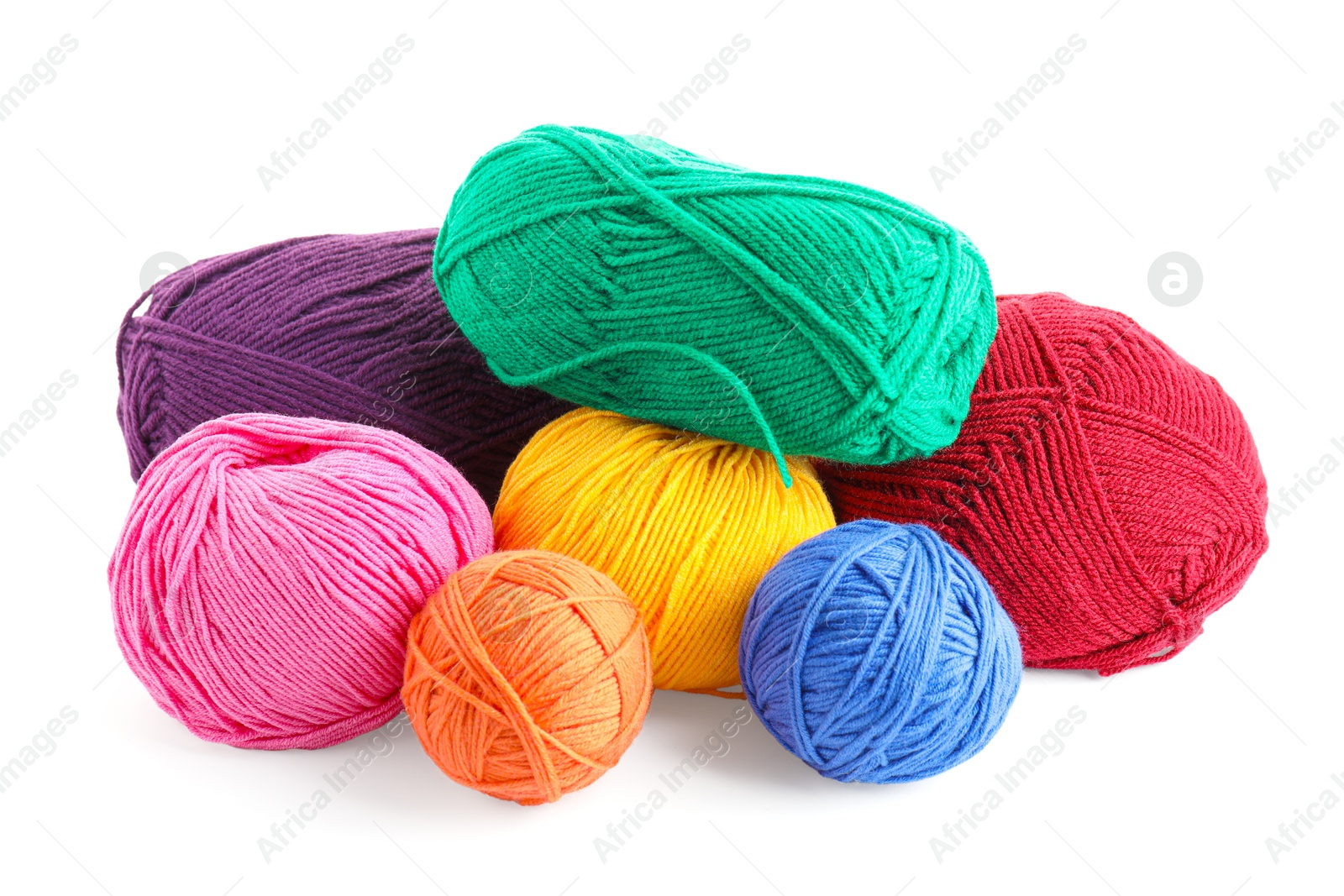 Photo of Many different bright yarns isolated on white