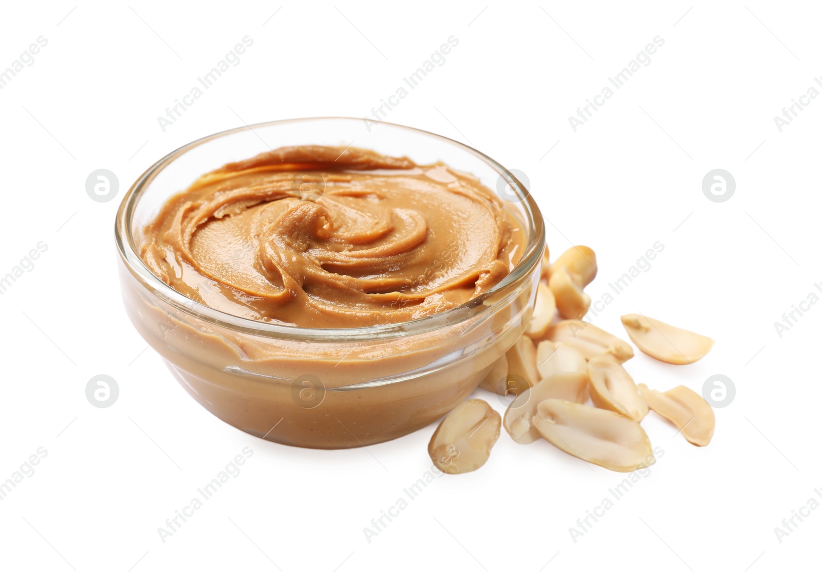 Photo of Tasty peanut butter in bowl and groundnuts isolated on white