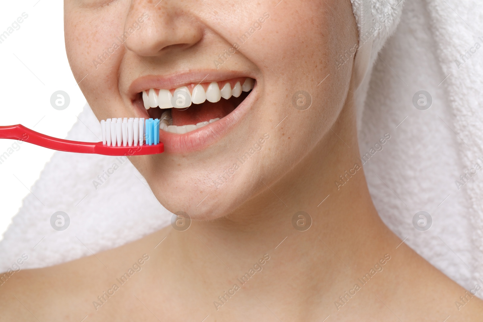 Photo of Woman brushing her teeth on white background, closeup