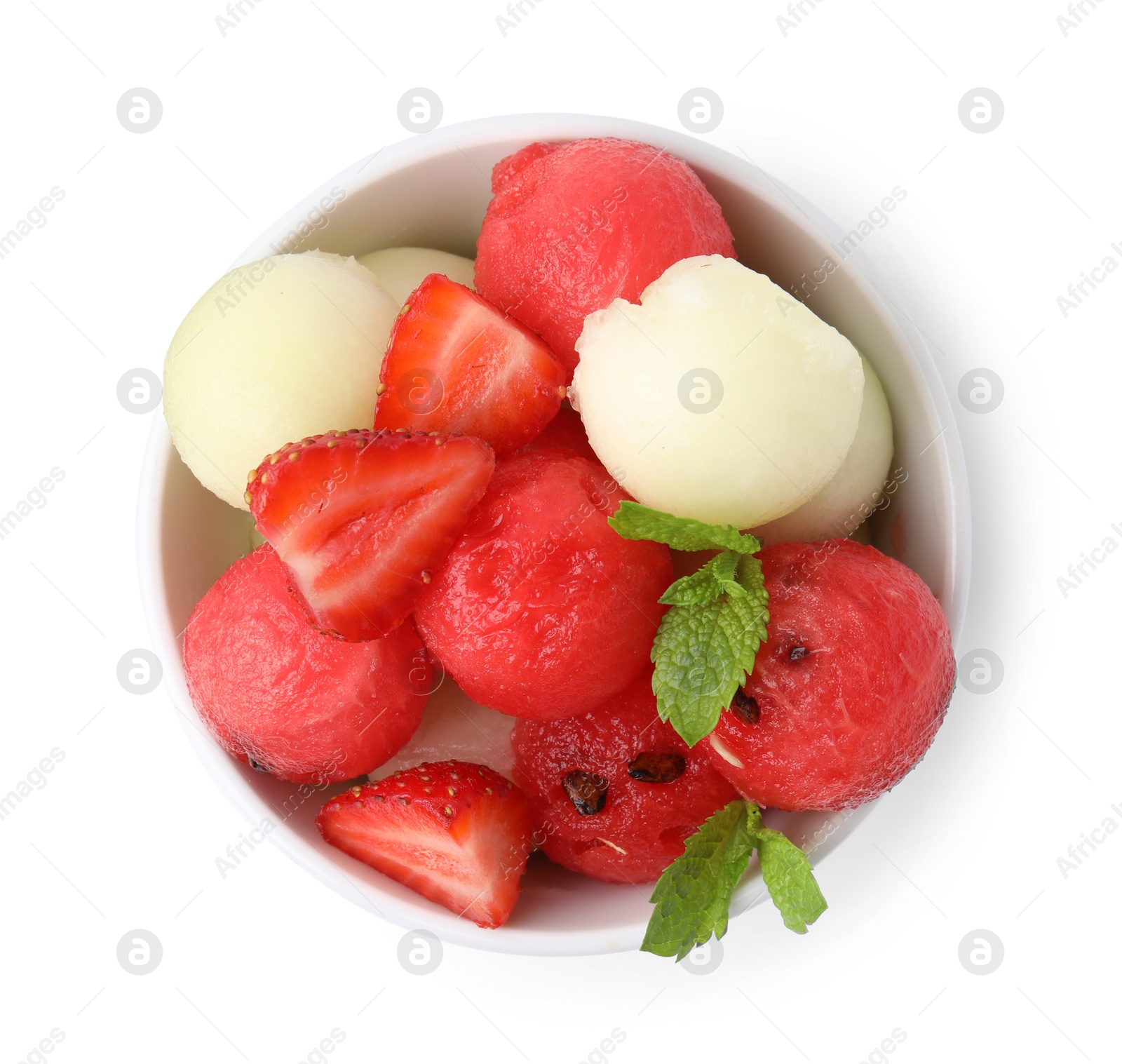 Photo of Tasty watermelon and melon balls with strawberries in bowl isolated on white, top view