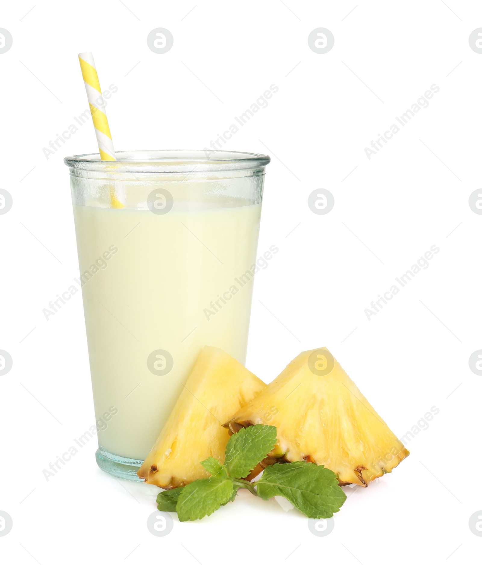 Photo of Tasty pineapple smoothie in glass, slices of fresh fruit and mint isolated on white