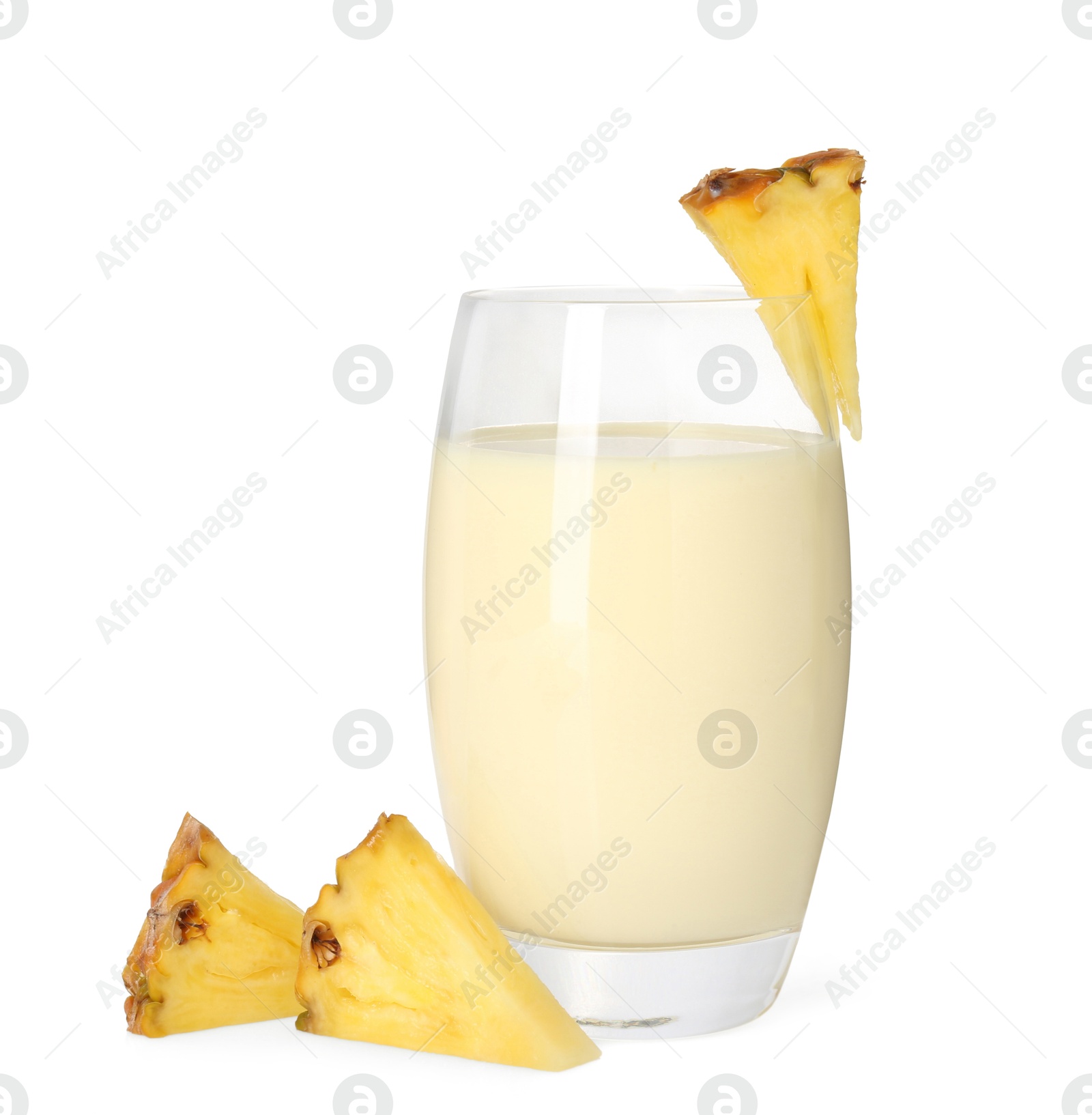 Photo of Tasty pineapple smoothie in glass and slices of fresh fruit isolated on white