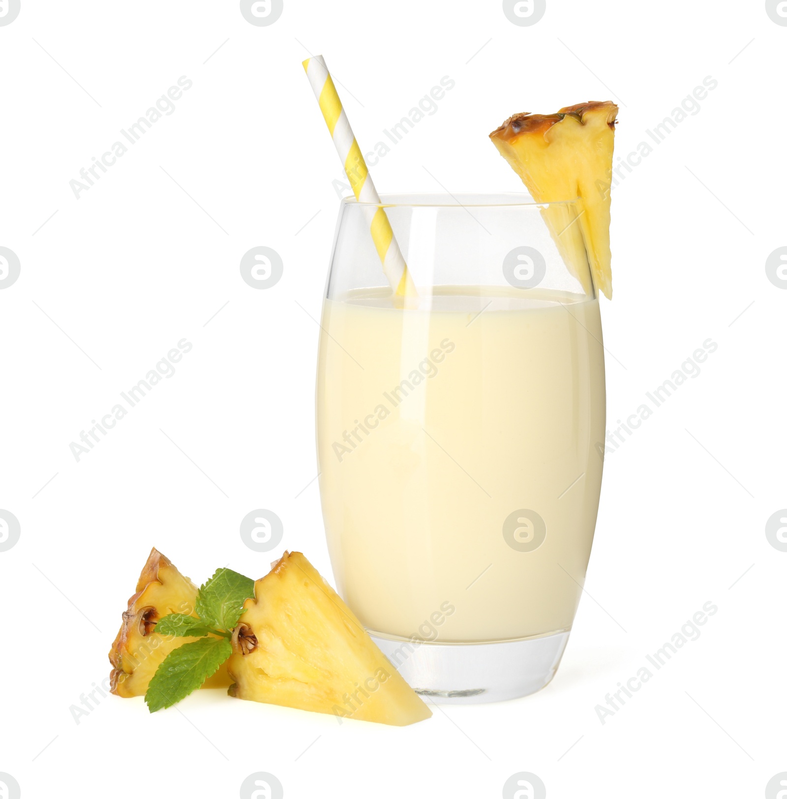 Photo of Tasty pineapple smoothie in glass, slices of fresh fruit and mint isolated on white