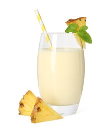 Photo of Tasty pineapple smoothie in glass, slices of fresh fruit and mint isolated on white