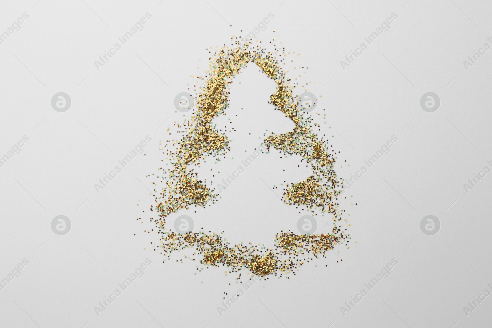 Photo of Christmas tree made of glitter on white background, top view