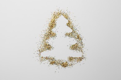 Christmas tree made of glitter on white background, top view