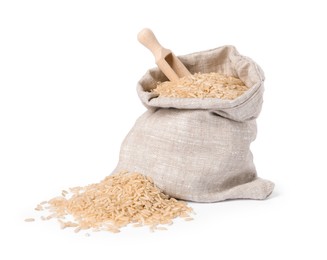 Photo of Raw rice in burlap with scoop isolated on white