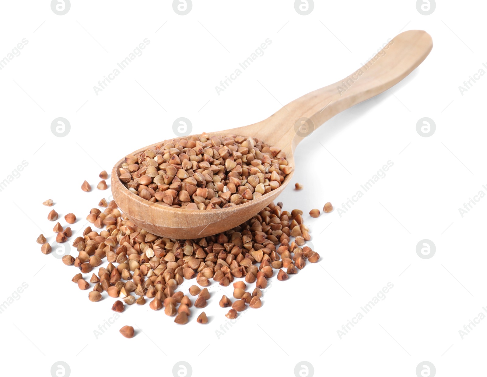 Photo of Raw buckwheat in wooden spoon isolated on white