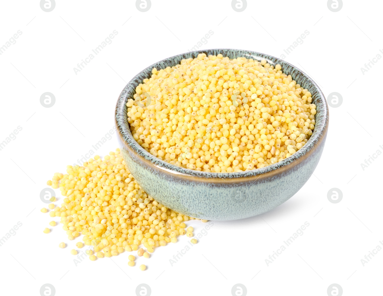 Photo of Millet groats in bowl isolated on white