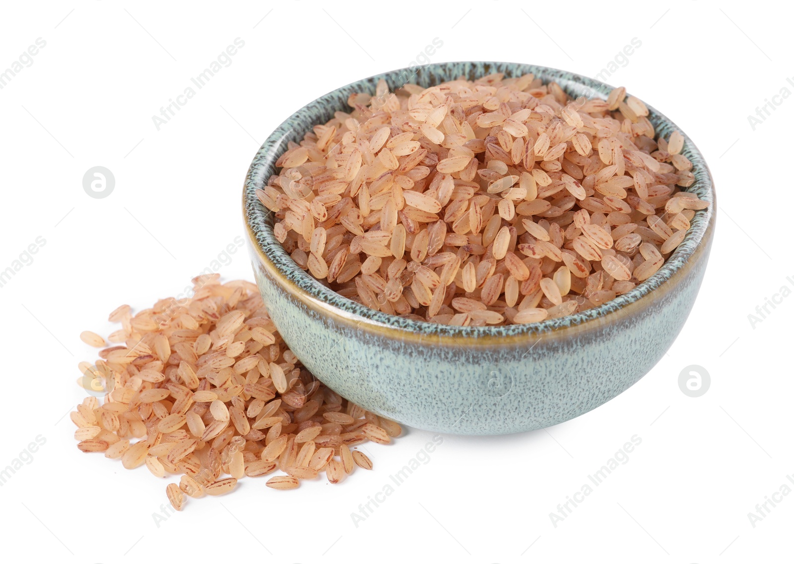 Photo of Raw organic matta rice in bowl isolated on white