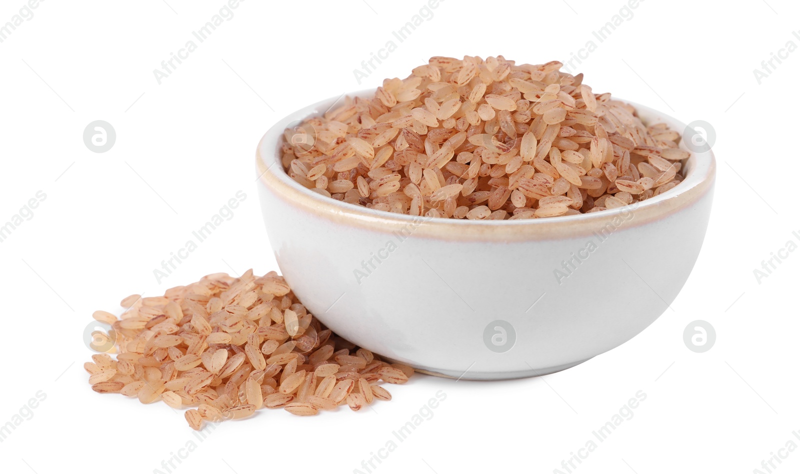 Photo of Raw organic matta rice in bowl isolated on white