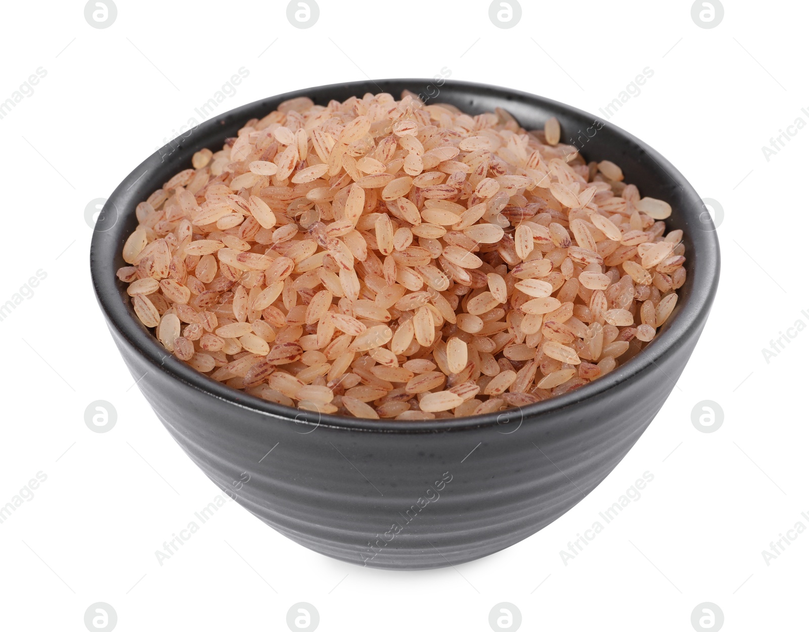 Photo of Raw organic matta rice in bowl isolated on white