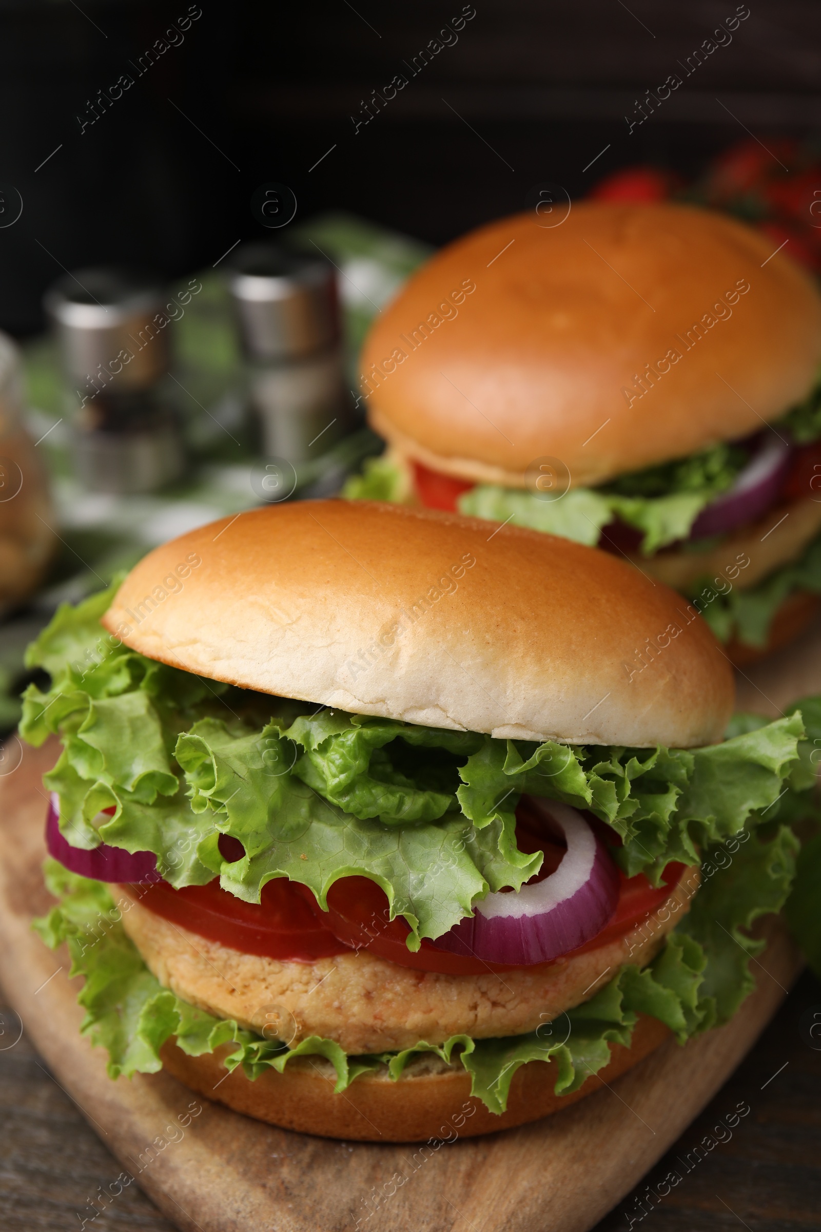 Photo of Delicious vegetarian burgers with chickpea cutlets on table, closeup