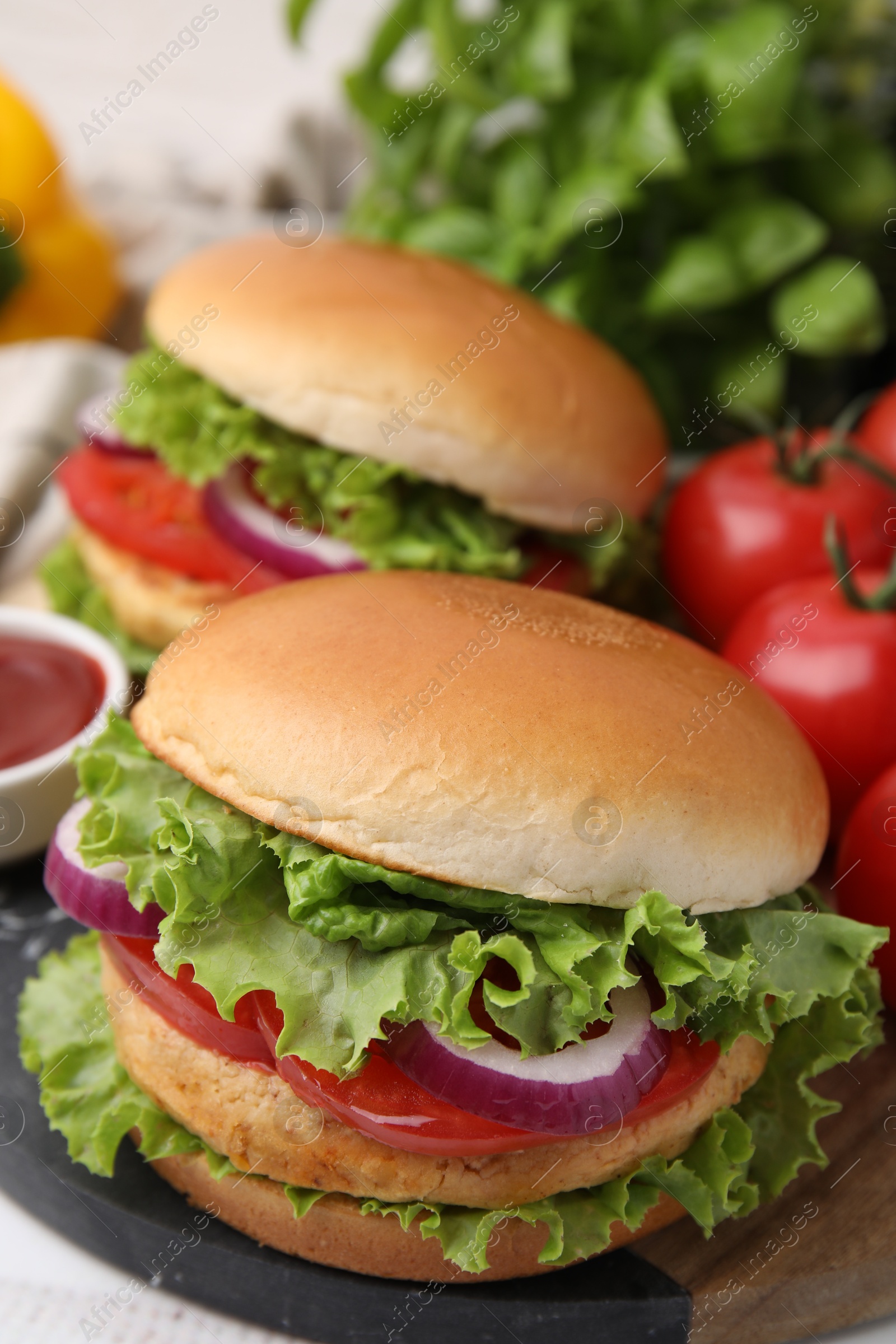 Photo of Delicious vegetarian burgers with chickpea cutlets on table, closeup