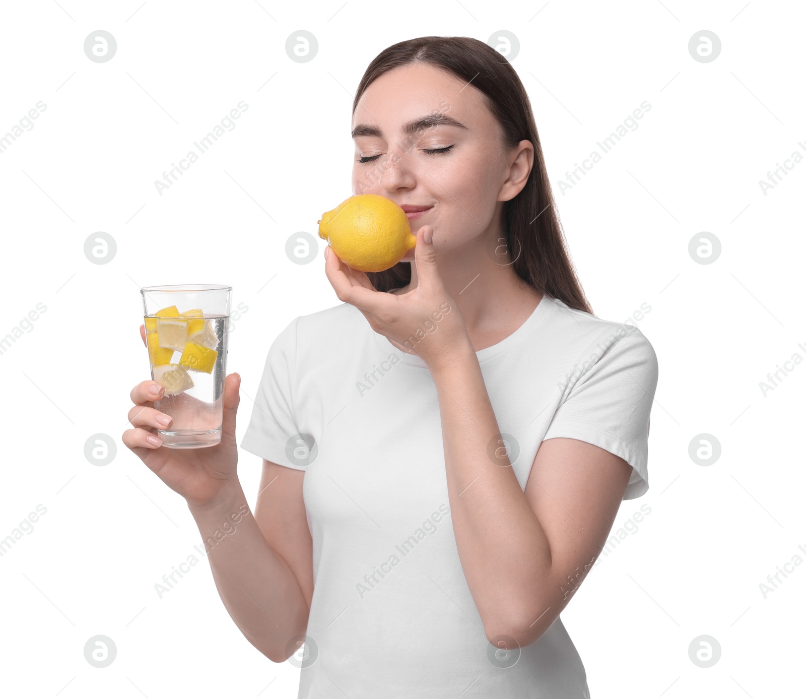 Photo of Woman with glass of lemon water and fruit on white background