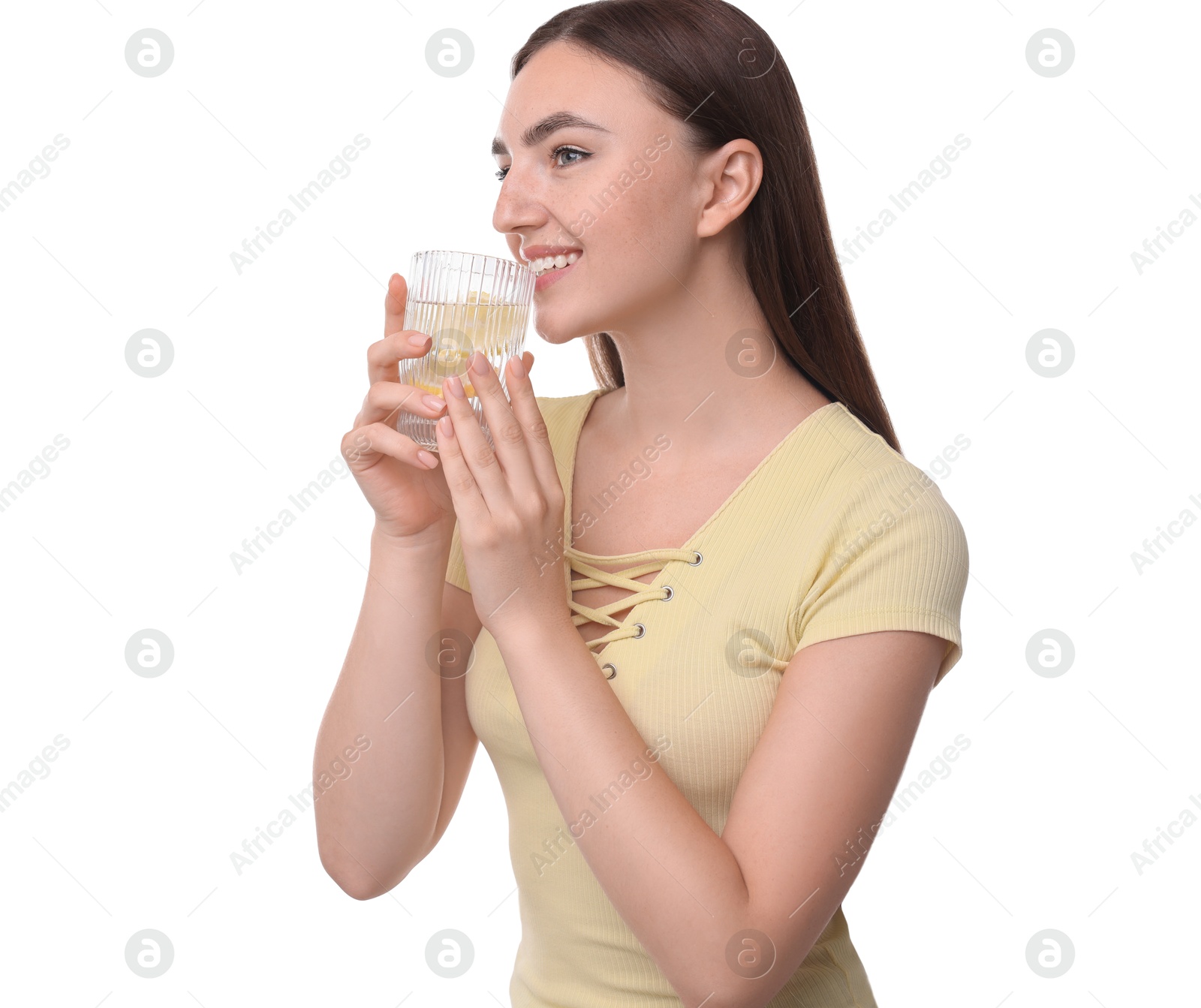 Photo of Woman drinking water with lemon on white background