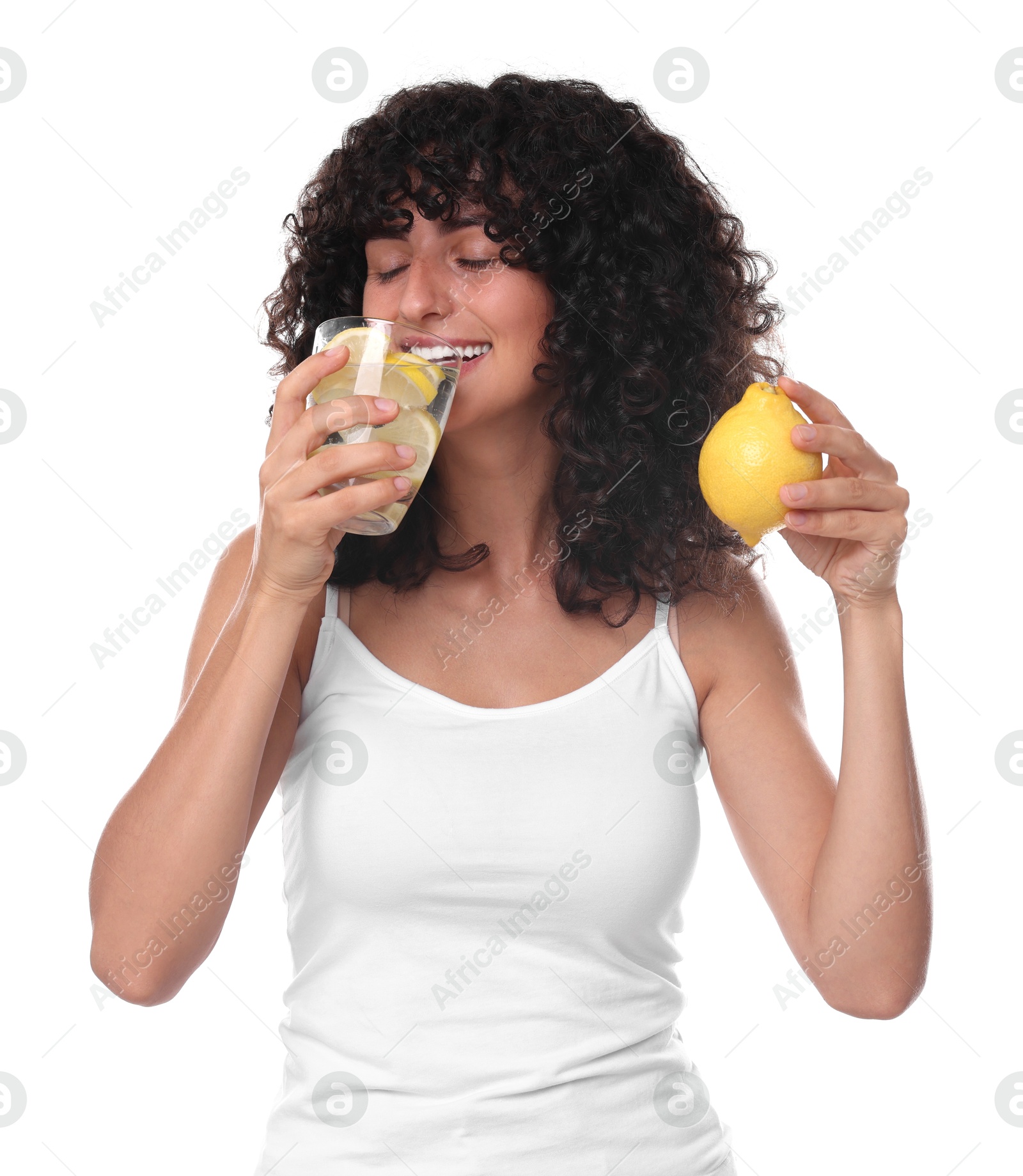 Photo of Woman drinking water with lemon on white background