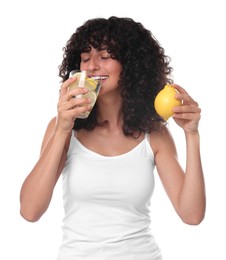 Photo of Woman drinking water with lemon on white background