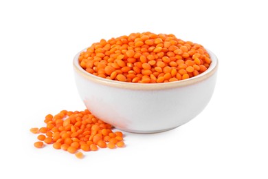 Photo of Raw lentils in bowl isolated on white