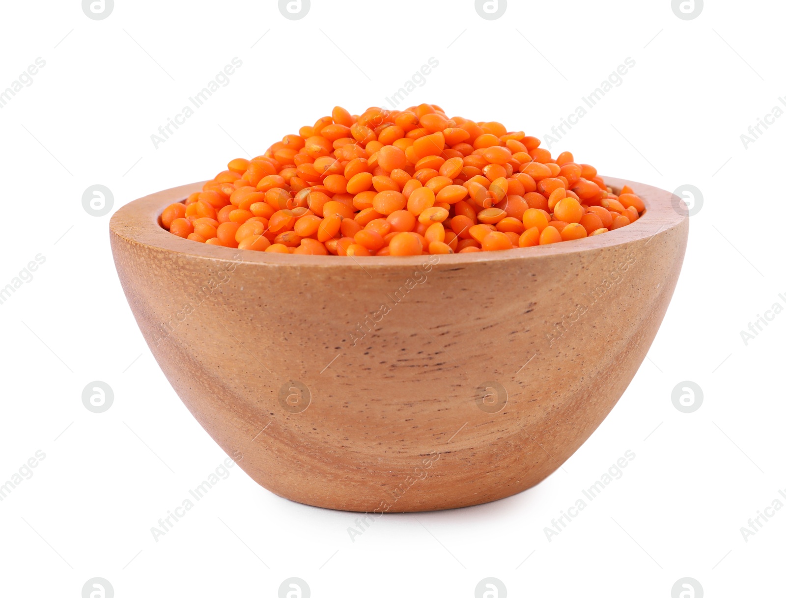 Photo of Raw lentils in bowl isolated on white