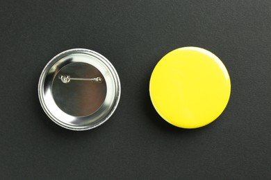 Photo of Button badges on black background, flat lay. Mockup for design