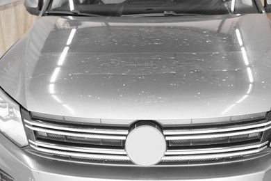 Photo of Modern auto with dirty stains, closeup view