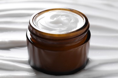 Photo of Jar with face cream, closeup. Cosmetic product