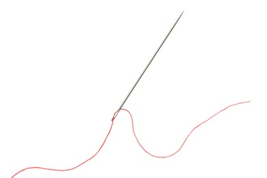 Photo of Sewing needle with red thread isolated on white